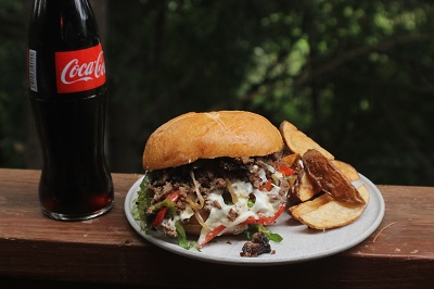 the_coach's_new_york_style_chopped_cheese_burger_with_wedges_and_coke