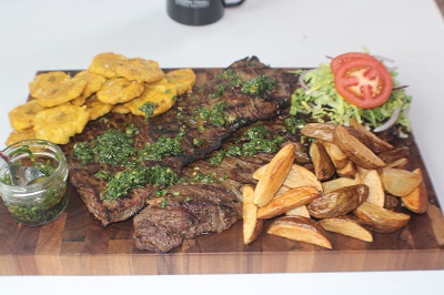 churrasco_with_potato_wedges_fried_green_platains_with_a_side_salad